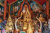 Chiang Mai - Wat Phra That Doi Suthep. The Buddha statues inside the Northern vihan. 